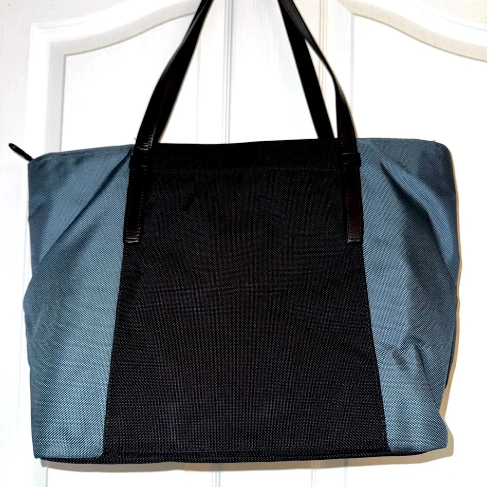 Tumi Two Tone Black and Gray Tote Bag with Modern Design Leather Straps